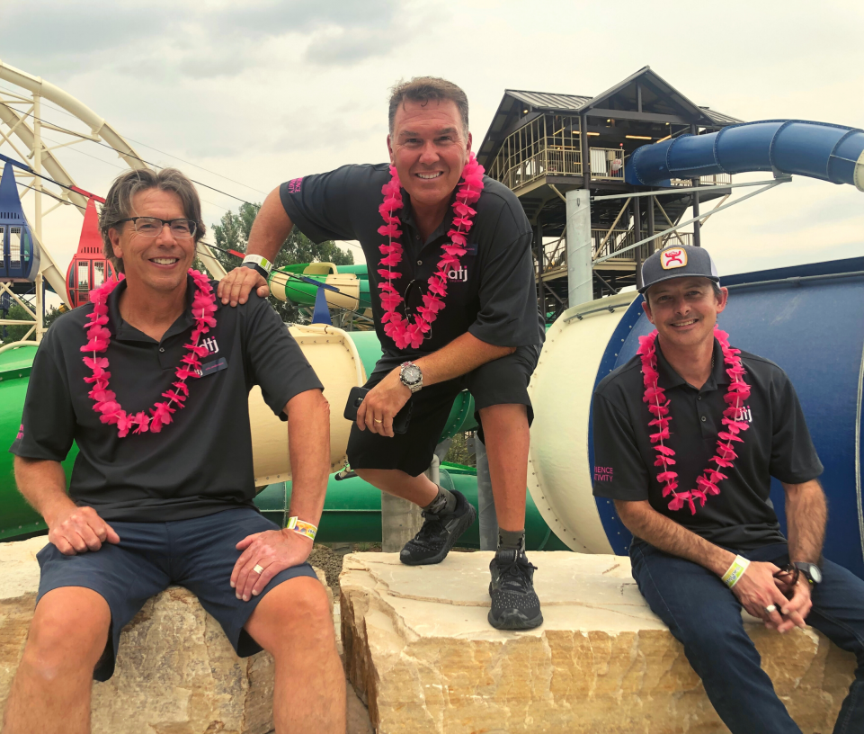 Guys having fun at an arcade